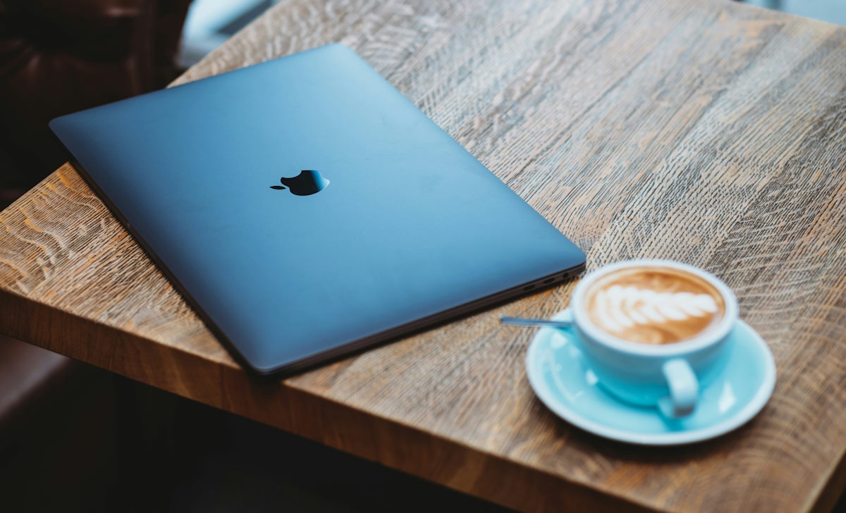 laptop on the table with coffee